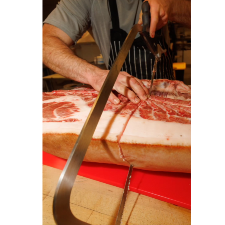 Thibault expertly breaks down whole cuts, using every part to craft his charcuterie—nothing goes to waste.